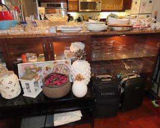 Storage trays, crystal bowls, luggage. Port Mierion china.