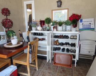 Storage cabinets, faux plants, topiaries, folding chairs, shoes. trays and baskets.