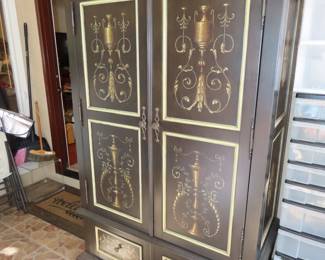 Large clothing armoir can be used as a TV cabinet too.