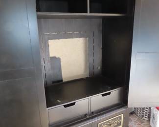 Large clothing armoir can be used as a TV cabinet too.