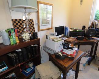 Office area, desk, stationery, two bookcases, Korean books and Bibles. clocks, frames, greeting cards.