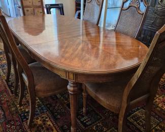 Dining set--has 2 arm chairs, 6 side chairs, table and 2 leaves