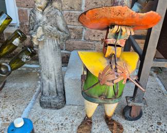 St Francis and metal Mexican man