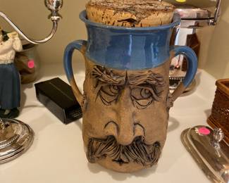 Large clay mug.  Cork comes off.