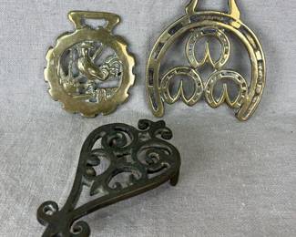 Trivet and Two Brass Horse Brasses