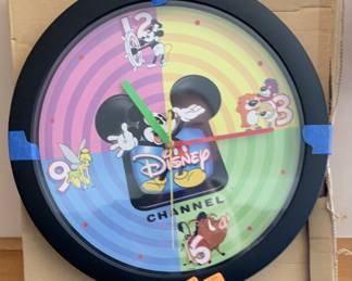 25 year old Disney battery operated wall clock with original packaging/box. Never used.