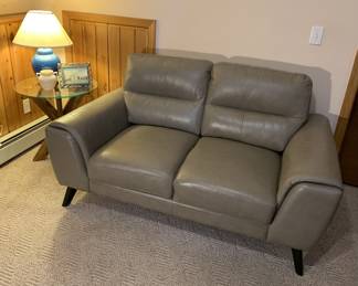 Faux leather loveseat in excellent condition