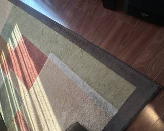 Floor rug has matching runner