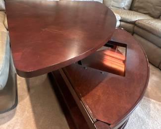 Coffee table with lift top open