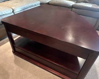 Coffee table with lift top closed