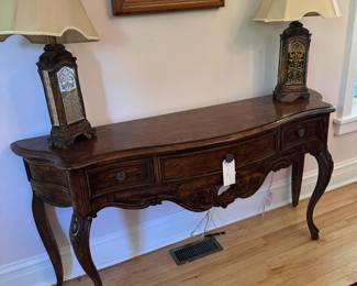 Pair of Horchow lamps with console table.