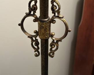 Antique floor lamp with ornate metalwork. Alternate view.