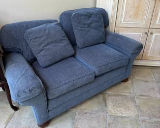 A second blue loveseat in excellent condition.