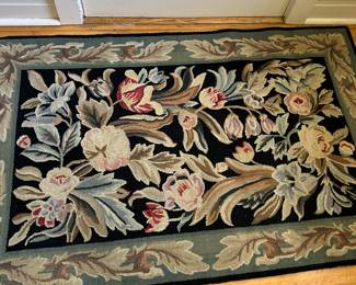 Hand hooked rug.