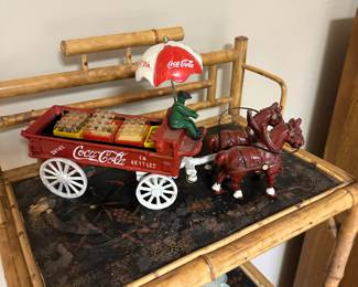 Coca Cola old-time delivery cart with horses.