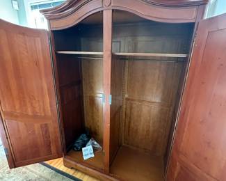 Inside of traditional armoire.