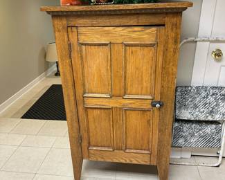 Antique rustic wooden small cupboard.