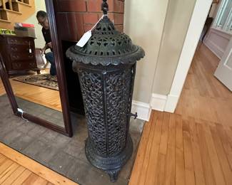 Godin heavy cast iron parlor stove.