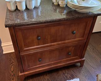 Two drawer cabinet with granite top. Great for kitchen or office.