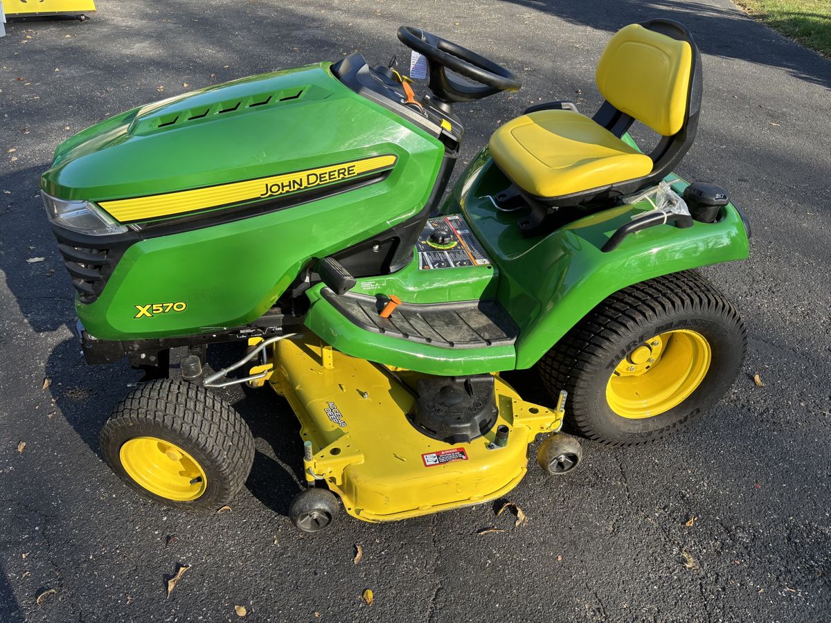 John Deere X570 mower with less than 33 hours