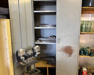Bench grinder & cabinet.