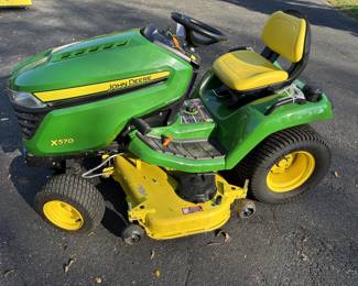 John Deere X570 mower with less than 33 hours
