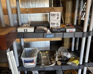 Assorted tools, circular saw blades, workshop hanging solutions
