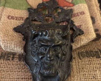 Cast iron match holder, devil face
