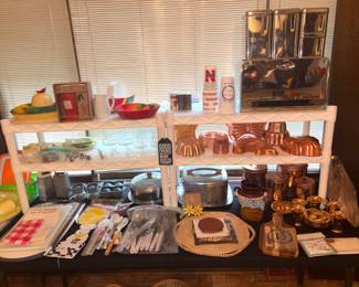 Vintage kitchen goodies including 5 piece canister set, copper molds, and copper cookware