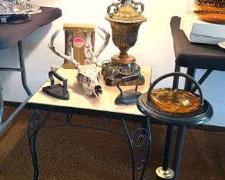 Taxidermy deer skull, vintage standing ashtray, vintage cast iron irons , marble top side side