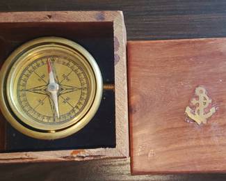 gimbaled compass in a wooden box.