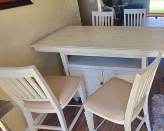 Ashley Furniture Bolanburg counter height dining table with a two-tone distressed finish and plank-effect top. 