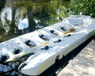 loading dock designed for personal watercraft (PWC), such as jet skis. These docks are also known as PWC ports or jet ski lift