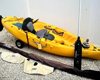 Hobie Mirage Sport kayak, which is a sit-on-top kayak designed for one person.