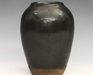A 20th century Pewabic Art Pottery vase. Ovoid form with matte Black glaze. Impressed "Pewabic Detroit" mark. Minor wear. 4 1/2" high.