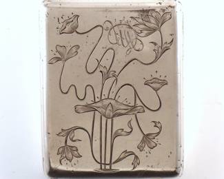 A turn of the century Russian Silver cigarette case. Hinged rectangular form featuring an engraved Art Nouveau style floral design. Double impressed Cyrillic "VA" mark attributed to Vasily Agafonov or Vasily Andreyev and "84" Kokoshnik hallmarks. 5.27 troy ozs total. Some surface wear and light scratches. 4" long.