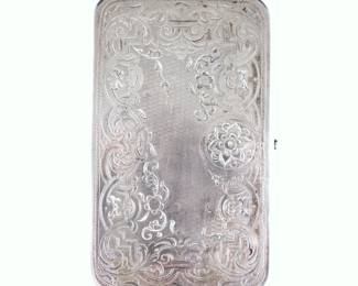 A mid 19th century Viennese Sterling Silver snuff box. Rectangular hinged box with engraved floral design. Impressed Vienna "A" Austria-Hungarian hallmark. 4.63 troy ozs total. Some surface wear, very light denting. 4 3/4" long.