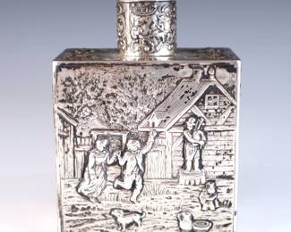 A late 19th century Continental Sterling Silver tea caddy. Square form with lift off cap and repousse decoration depicting genre scenes of daily life. Impressed hallmarks, likely German Hanau, tested Sterling. 9.0 troy ozs total. Some surface wear. 4 3/4" high.