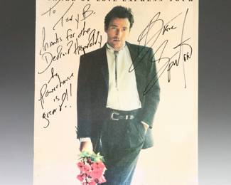 A 1988 Bruce Springsteen Autographed Tour Booklet from the Tunnel of Love Express Tour. Autographed in Black marker "To Tony B. Thanks for the Detroit Hospitality the Powerhouse is great! Bruce Springsteen". Comprised of various color photographs, songs and lyrics. Copyright 1988, The T Shirt Company. Some wear to edges and inscription. 11 x 14" high overall.