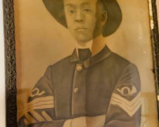 framed circa 1870's photo of a Buffalo Soldier.  Buffalo Soldiers were post Civil War African American Cavalry troops that were sent to the West.  This is a rare find.  