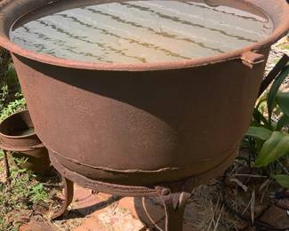 cast iron syrup kettle with original stand--kettle is 34" across