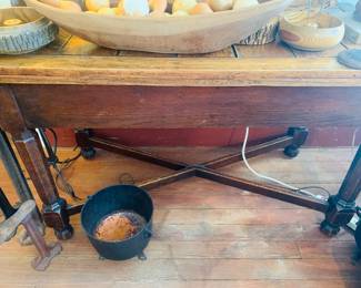 Early gate leg table--Top flips over, legs swing out and this makes a large square table