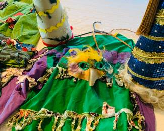 vintage Mardi Gras costumes with masks and pointed hats