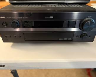 It delivers 7.1-channel surround sound with 110 watts per channel (8 ohms, 0.04% THD), supporting Dolby Digital, DTS, and Yamaha’s proprietary Cinema DSP for enhanced audio effects. It features multiple inputs (including multi-channel for external decoders), AM/FM tuning, and supports older video formats like composite and S-video, though HDMI is absent (common for its era).
