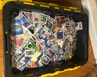Tub of assorted trading cards