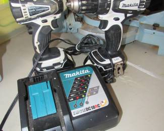 Pair of Makita drills with charger