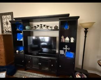 Entertainment center comes apart in 4 sections. TV not included.