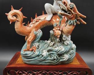 Chinese Nezha Riding a Dragon Porcelain Figurine