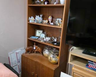 Gorgeous teak furniture from the mid-century era — solid, sleek, and built to last.