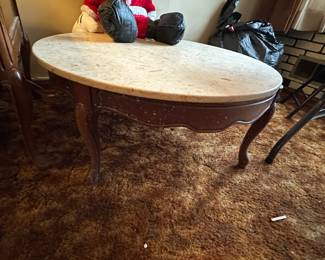 Round marble topped coffee table